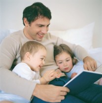 A father reading to his children