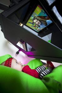 Ansley Brane, a typically-developing 5-month-old participating in eye-tracking research at Marcus Autism Center. 